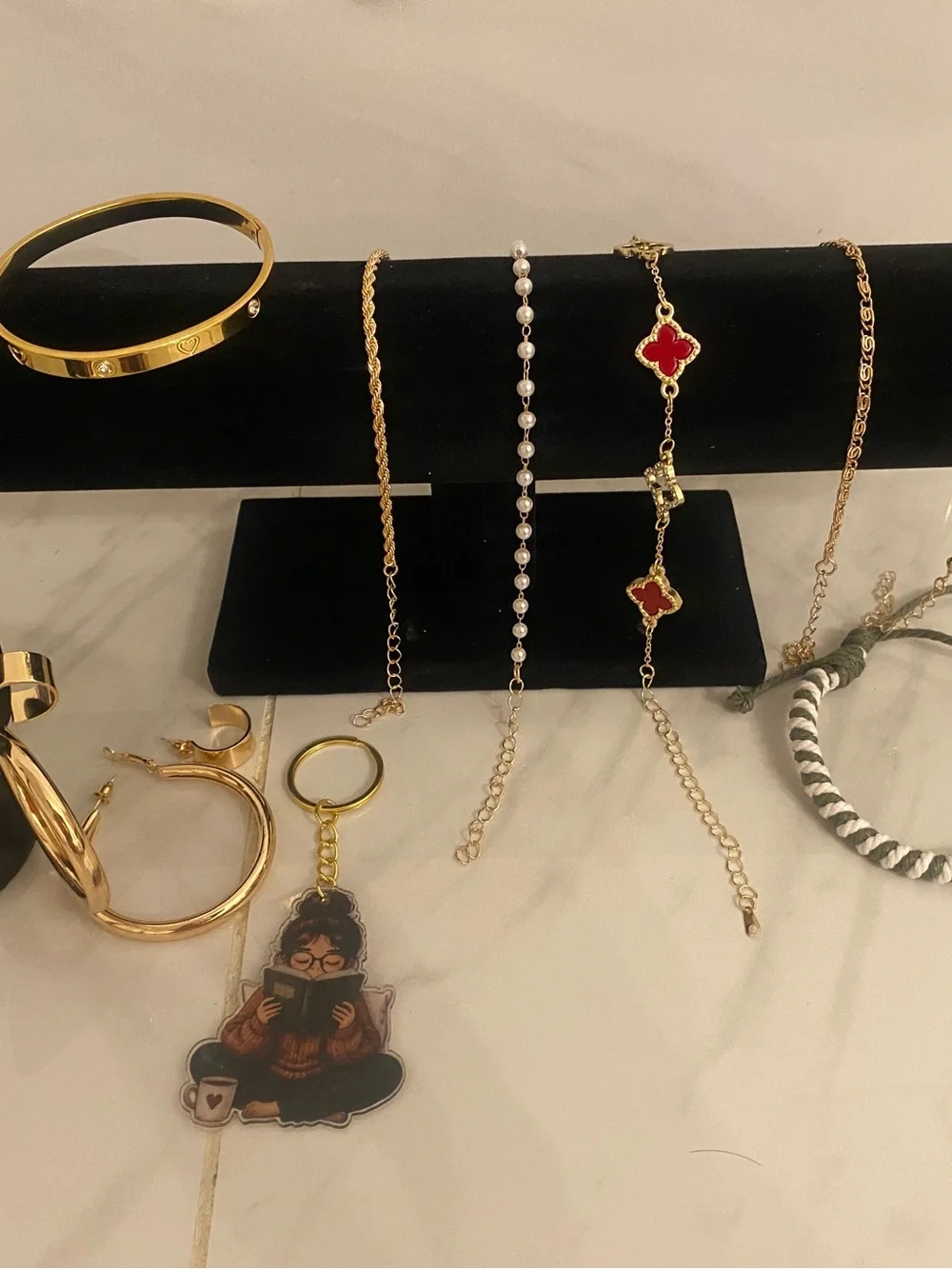 Gold Tone Women’s Bracelet with Red Clover Accents